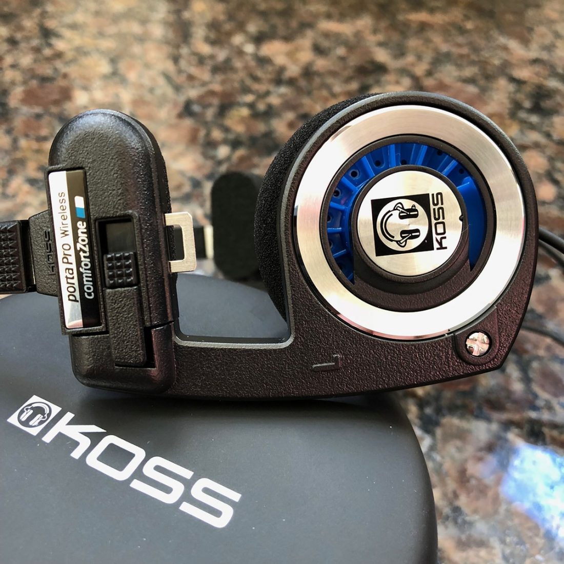 Koss Porta Pro Wireless and zippered case (the side ear plates look like musical notes)