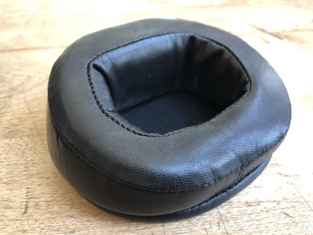 A large angled lambskin leather MrSpeakers Alpha Dog ear pad.
