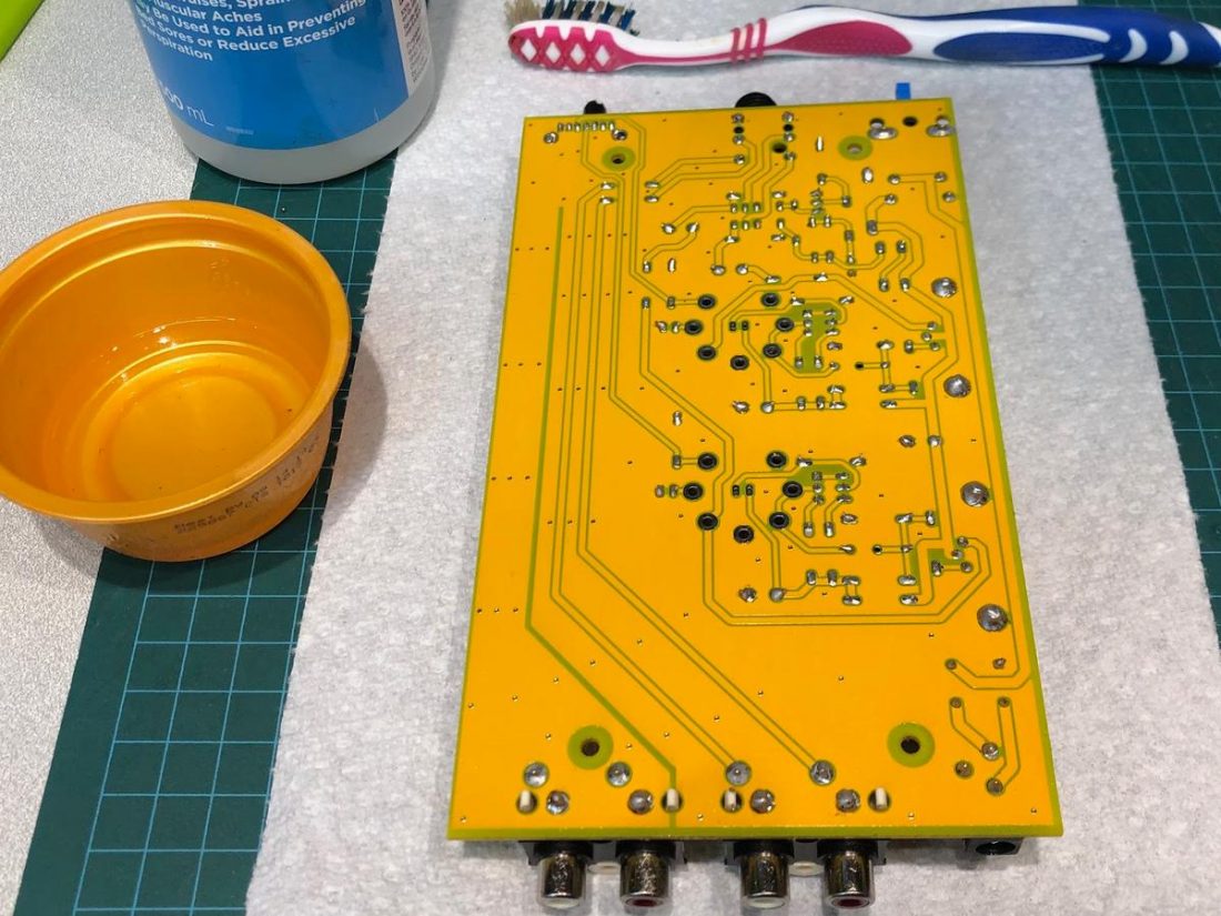 Use an old toothbrush and rubbing alcohol to remove flux and clean the board once soldering is completed.