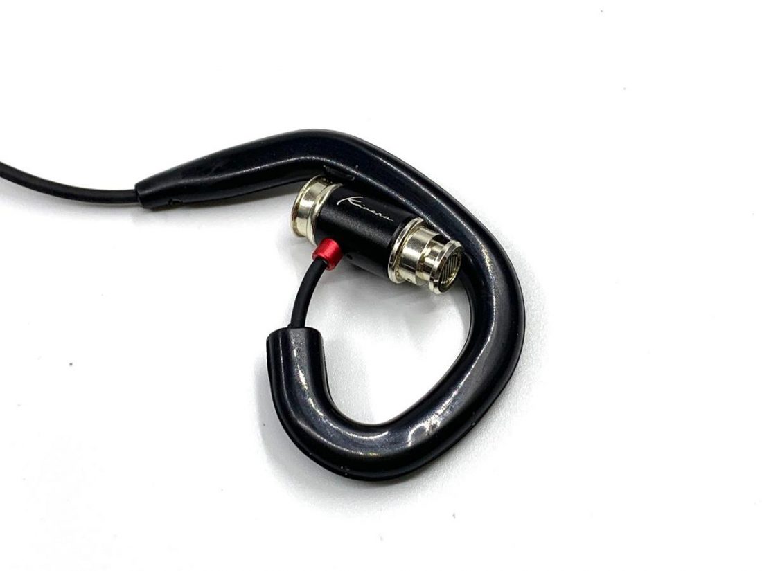 Ear hook is used to reduce microphonics from cable.