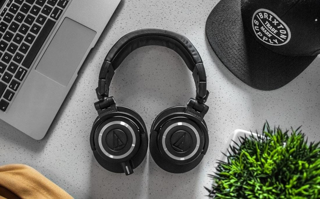 Bluetooth headphones on office table (From Pexels.com)