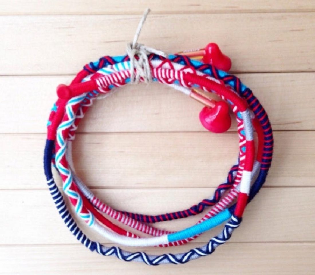 Wrap your headphone wires in colorful yarn or embroidery threads to keep them knot-free. (From: Etsy)