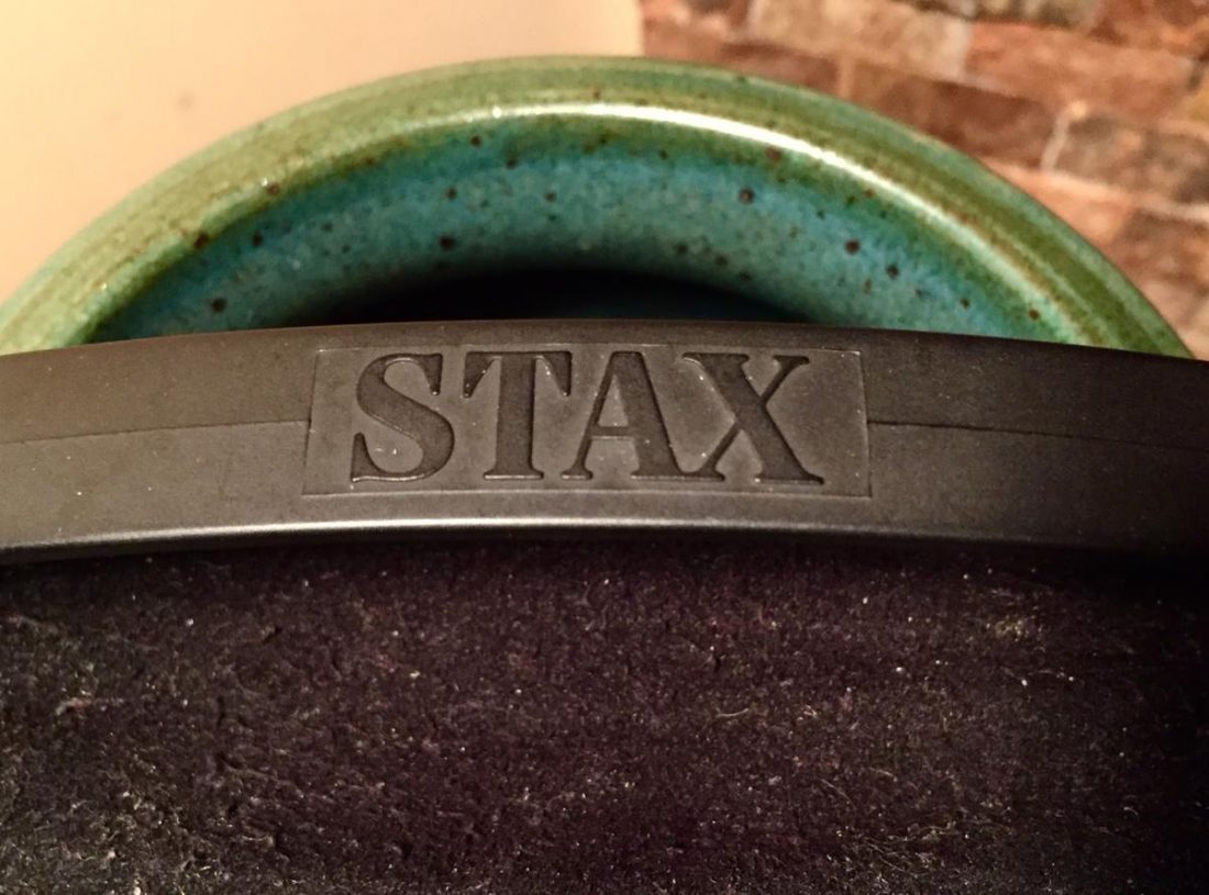 The Stax logo is subtly emblazoned on the plastic headband