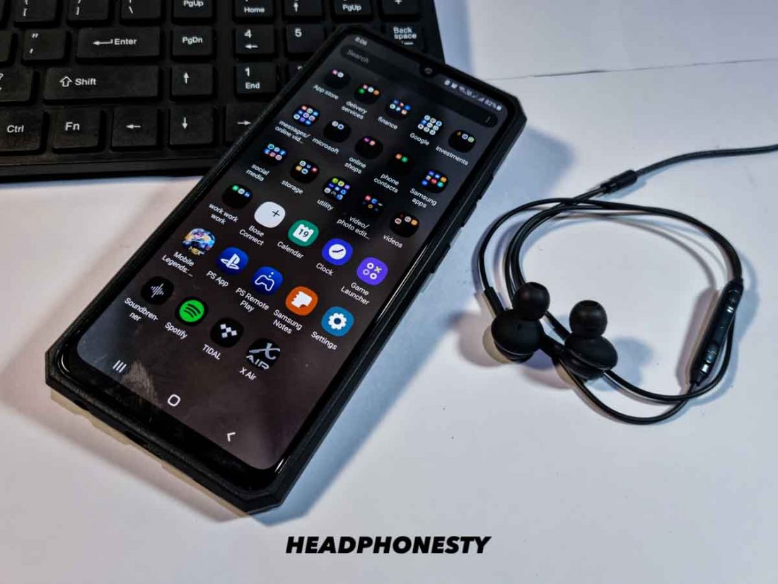 Plug the headphones into a different device