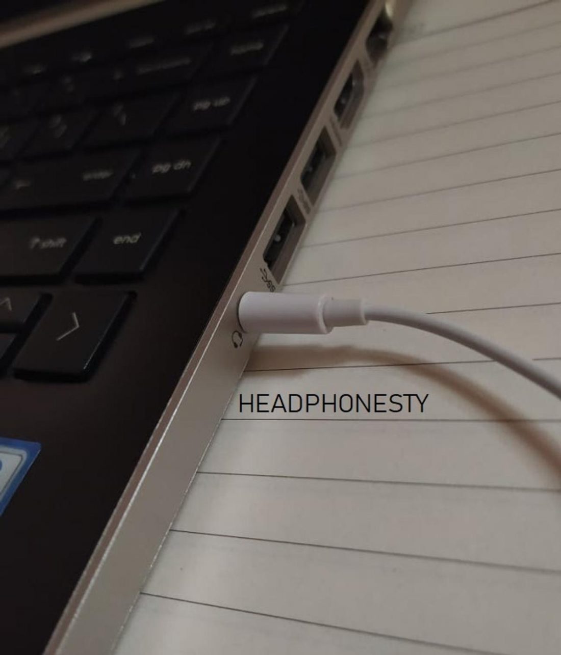 Plugging in earphones to Laptop