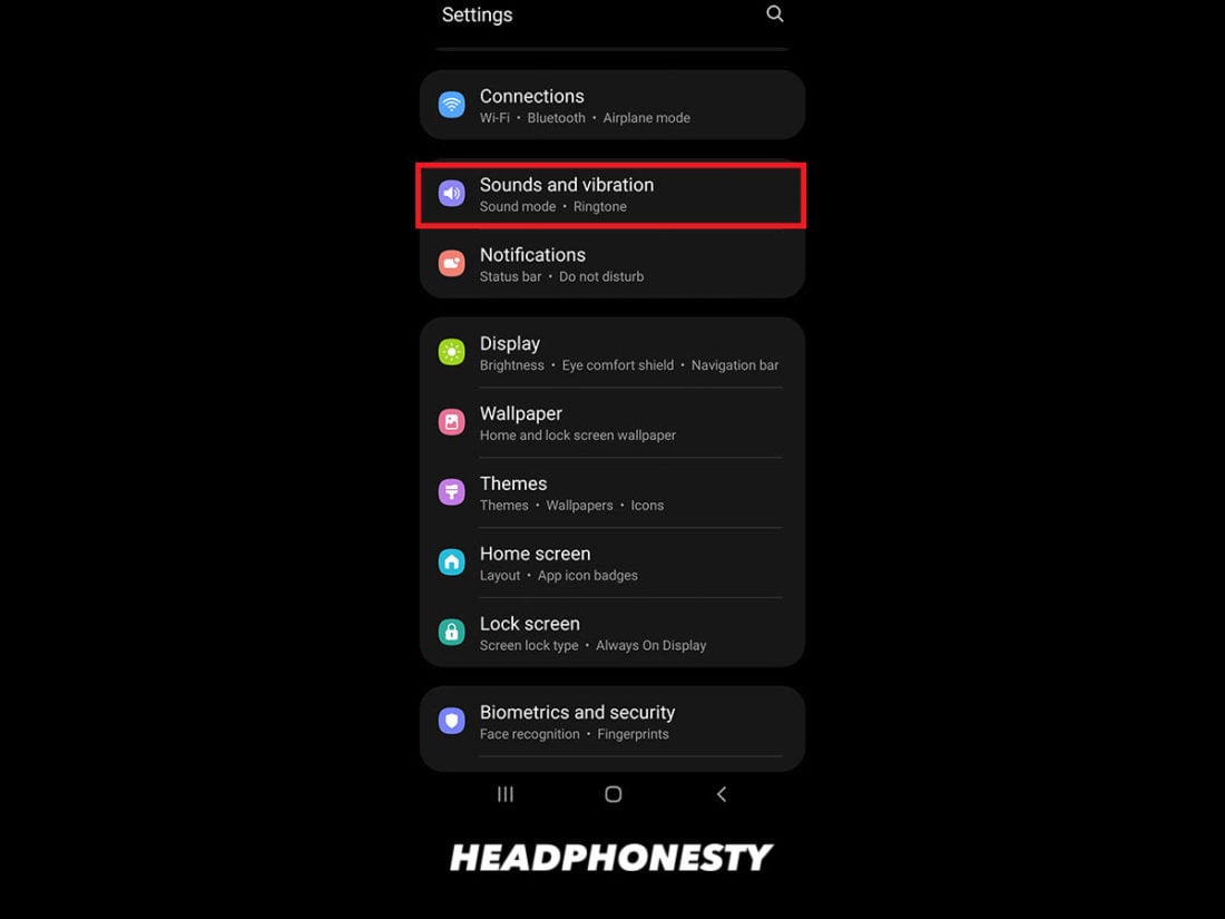 Click the arrow button next to your headphones.
