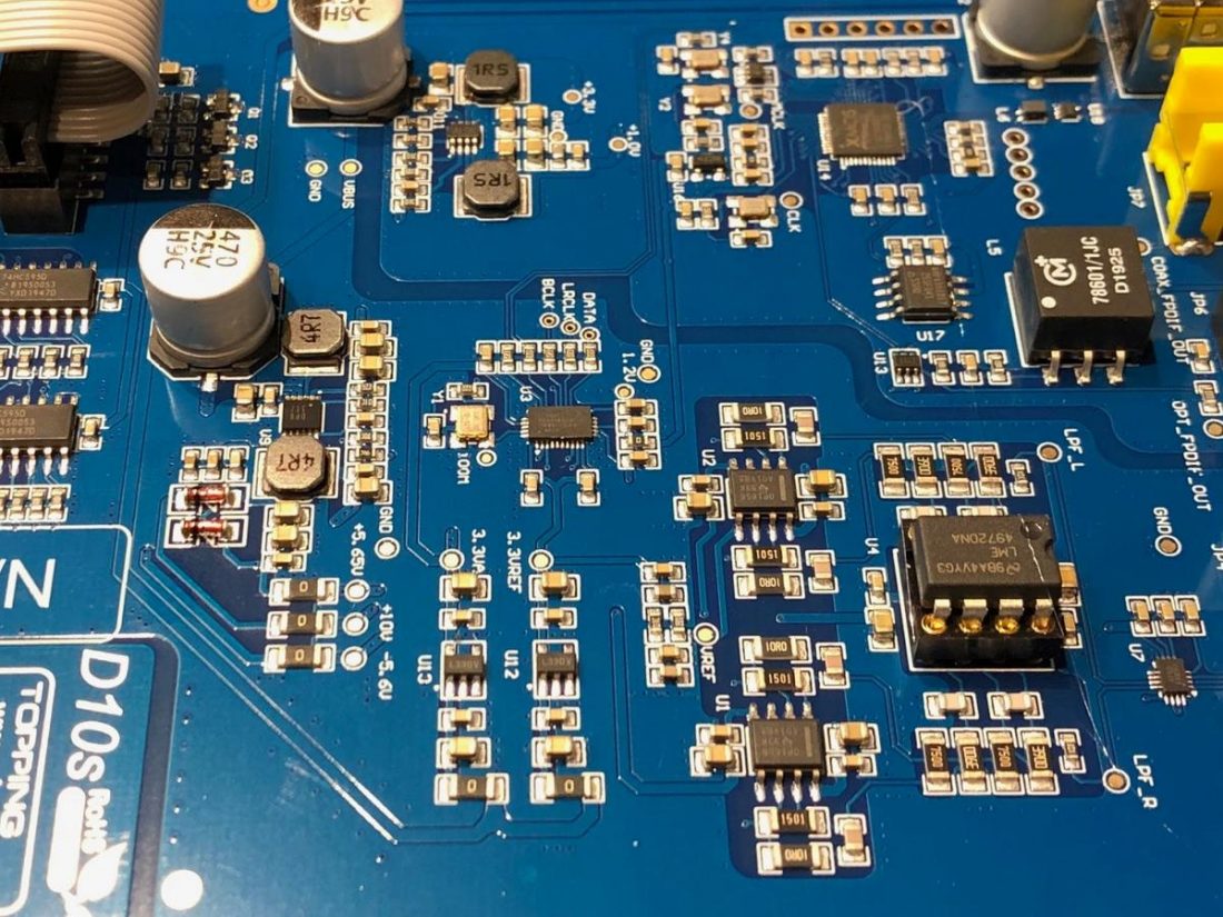 The socketed op-amp chip (on the right) on the TOPPING D10s board.