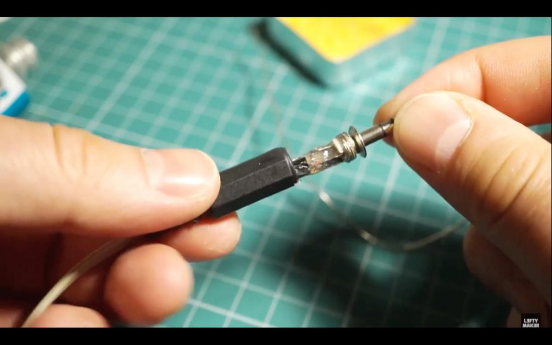 Screw the casing back into the plug (From Youtube.com/LeftyMaker)