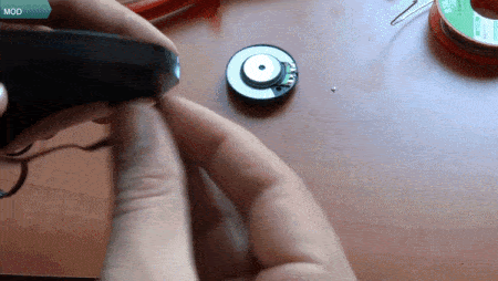 Inserting wire into headphone (From:HTibor DIY Youtube).