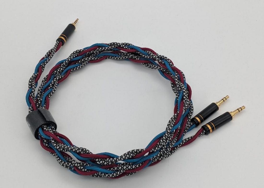 A 2.5mm balanced cable to dual 3.5mm headphone connectors.