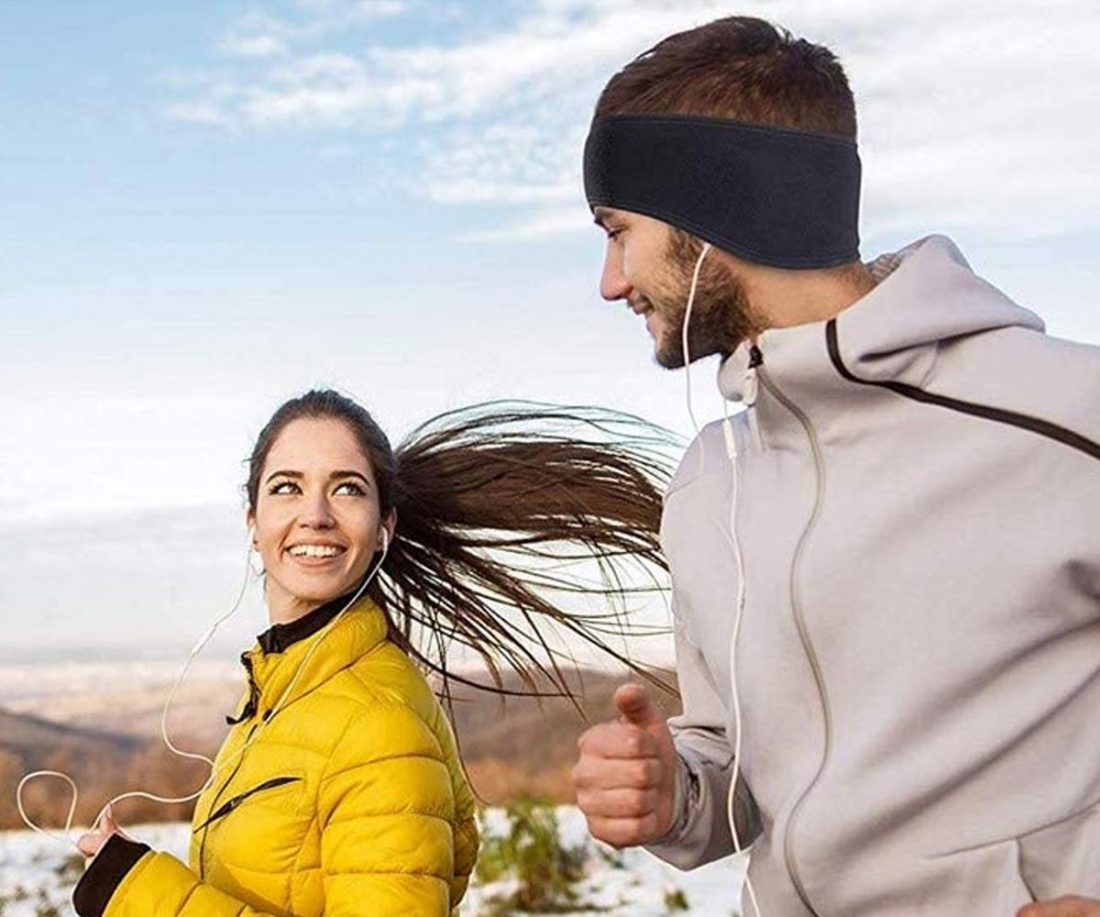 Man wearing earphones and ear warmer (From: Amazon)