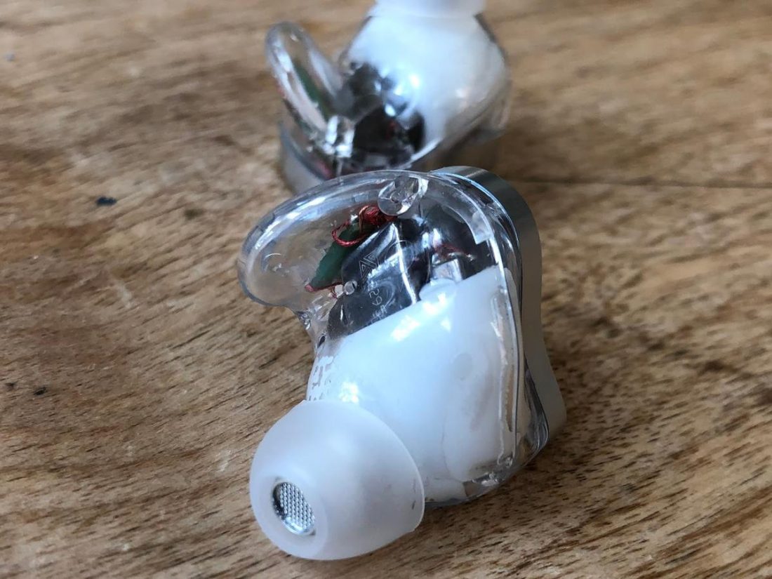 The combination of the new thin white silicone ear tip and large body size makes it difficult to get a proper seal in the ear canal.