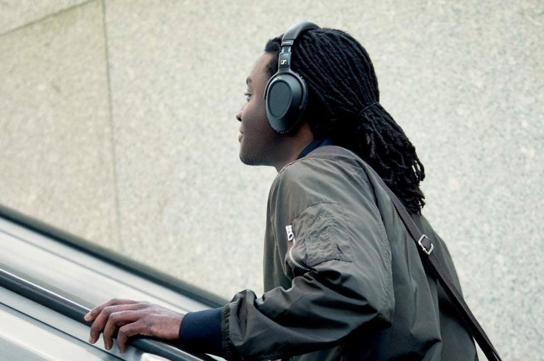 Man wearing Sennheiser PXC 550-II Headphones - best noise cancelling headphones under $300(From: Amazon)