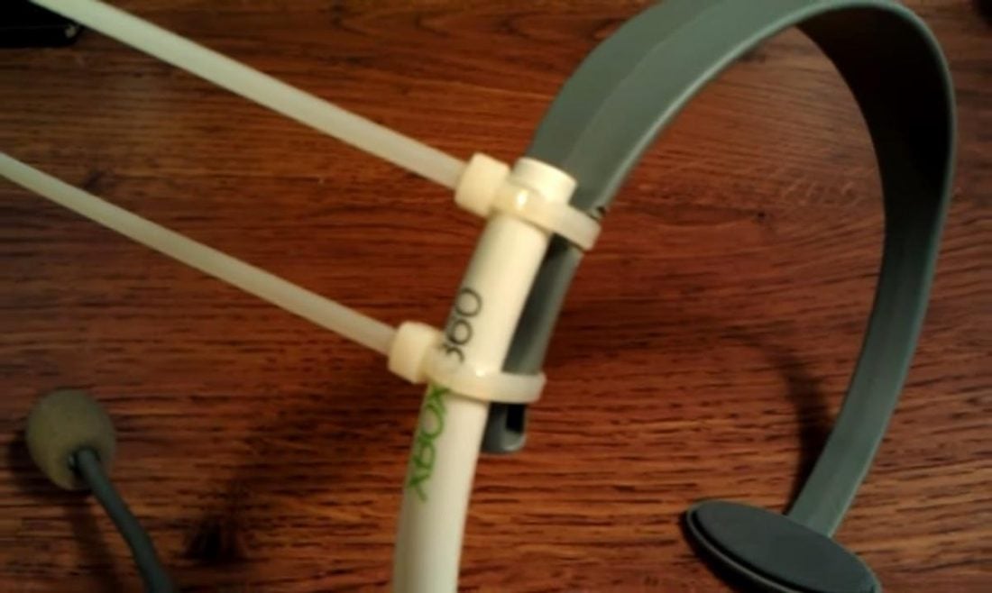 Using cable ties to secure the broken headphone band. (From: Youtube/Lowery02)