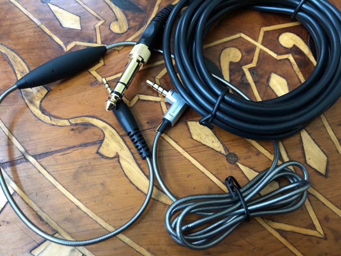 The longer black cable and shorter silver cable.