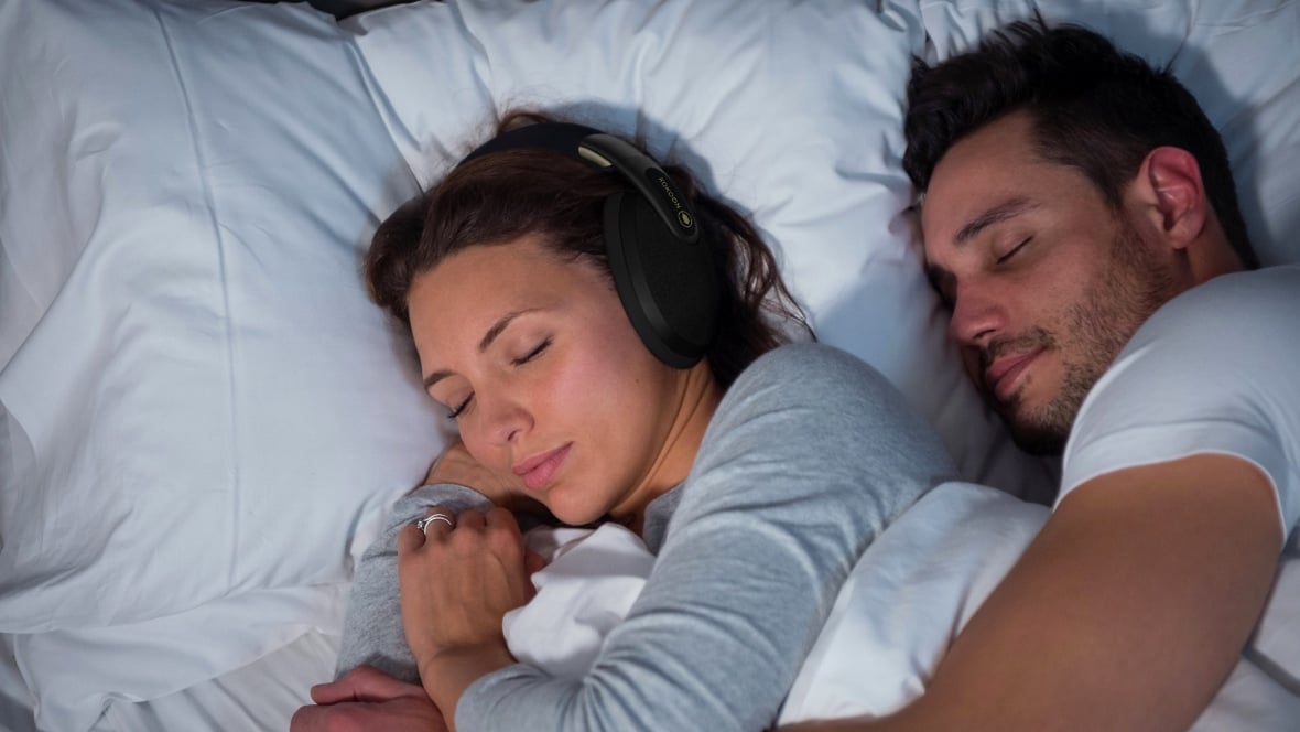 Woman sleeping while wearing Kokoon Sleep Headphones (From: Kokoon)