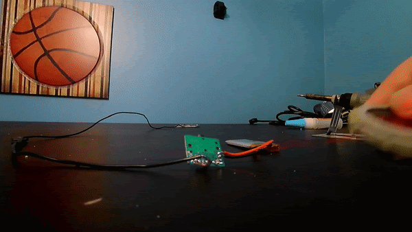 Soldering speakers to a headphone circuit board. (From: Brandon Pyle Youtube).