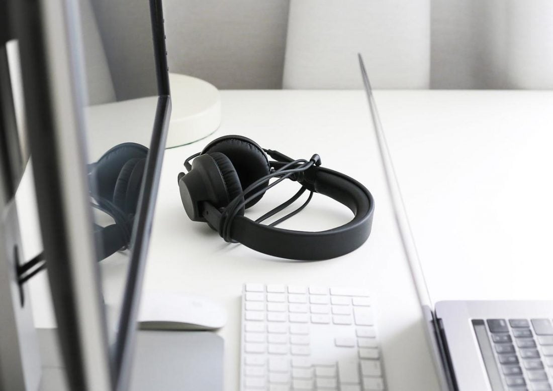 Wired headphones and PC (From: Unsplash)