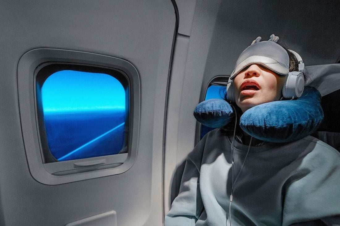 A travel pillow can provide support for your headphones when sleeping on a flight (From DurangoHerald.com)