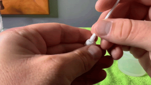 Cleaning the silicone tips. (From: David The Apple Tech Guy YouTube)