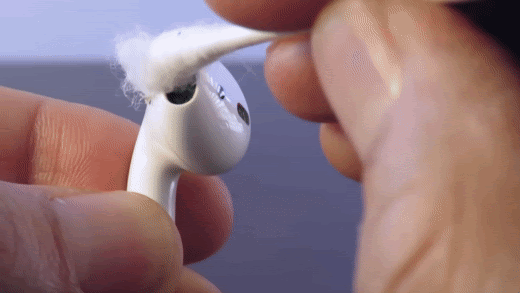 Cleaning AirPods with a cotton swab. (From: Jon Collins YouTube)