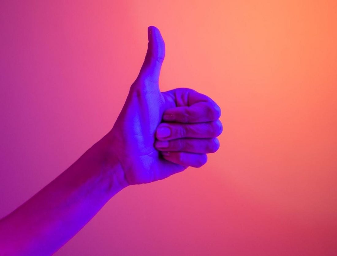 Thumbs up with pink background (From: Pexels)