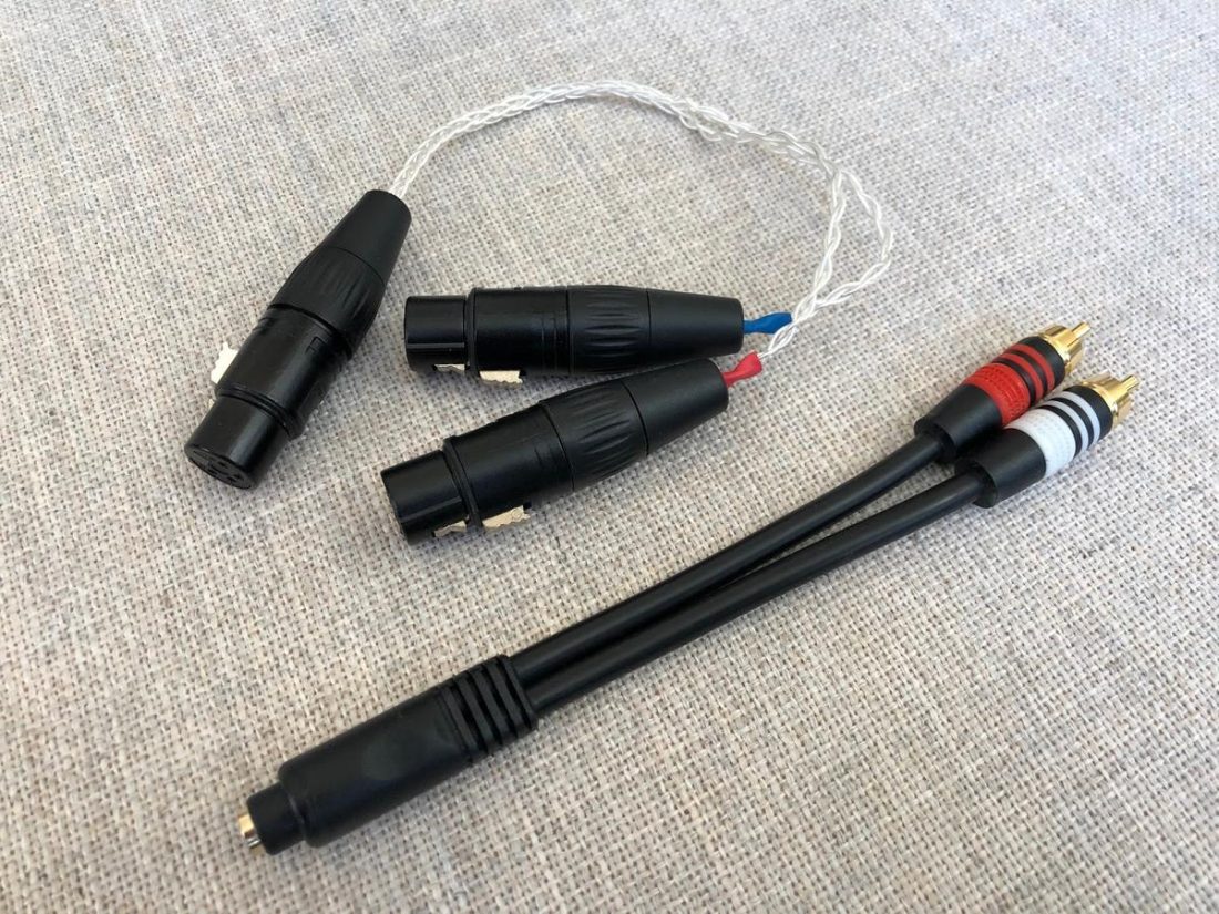 The balanced headphone adapter from eBay (rear) and single-ended Monoprice headphone adapter (front).