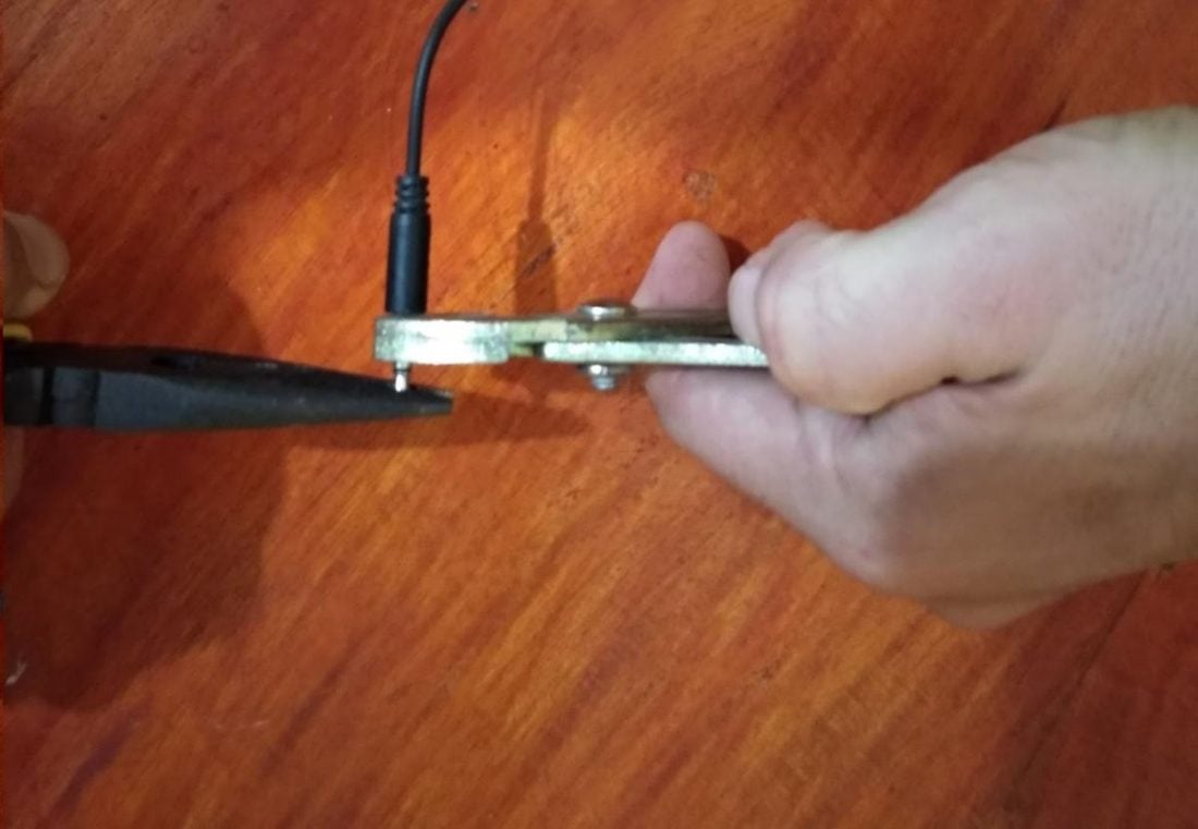 Use pliers to straighten the jack.