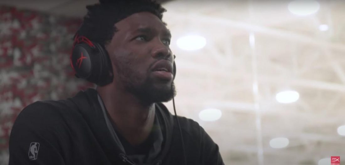 Joel Embiid using the HyperX Cloud Alpha while paying. (From: YouTube/HyperX)