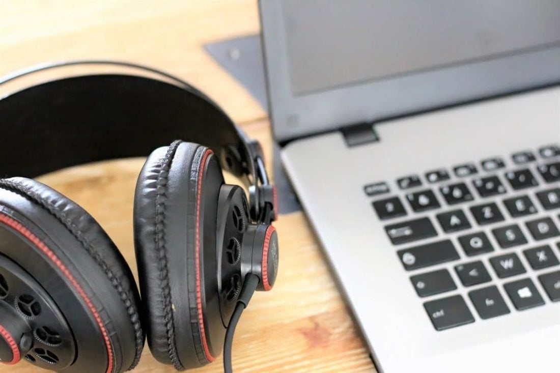 Headphones Next to a Laptop (From: Unsplash)