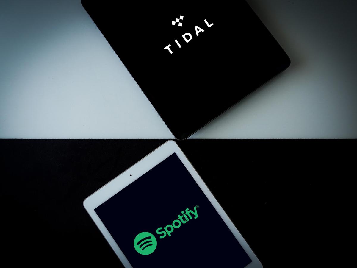 Tidal and Spotify on iPads (From:Unsplash).