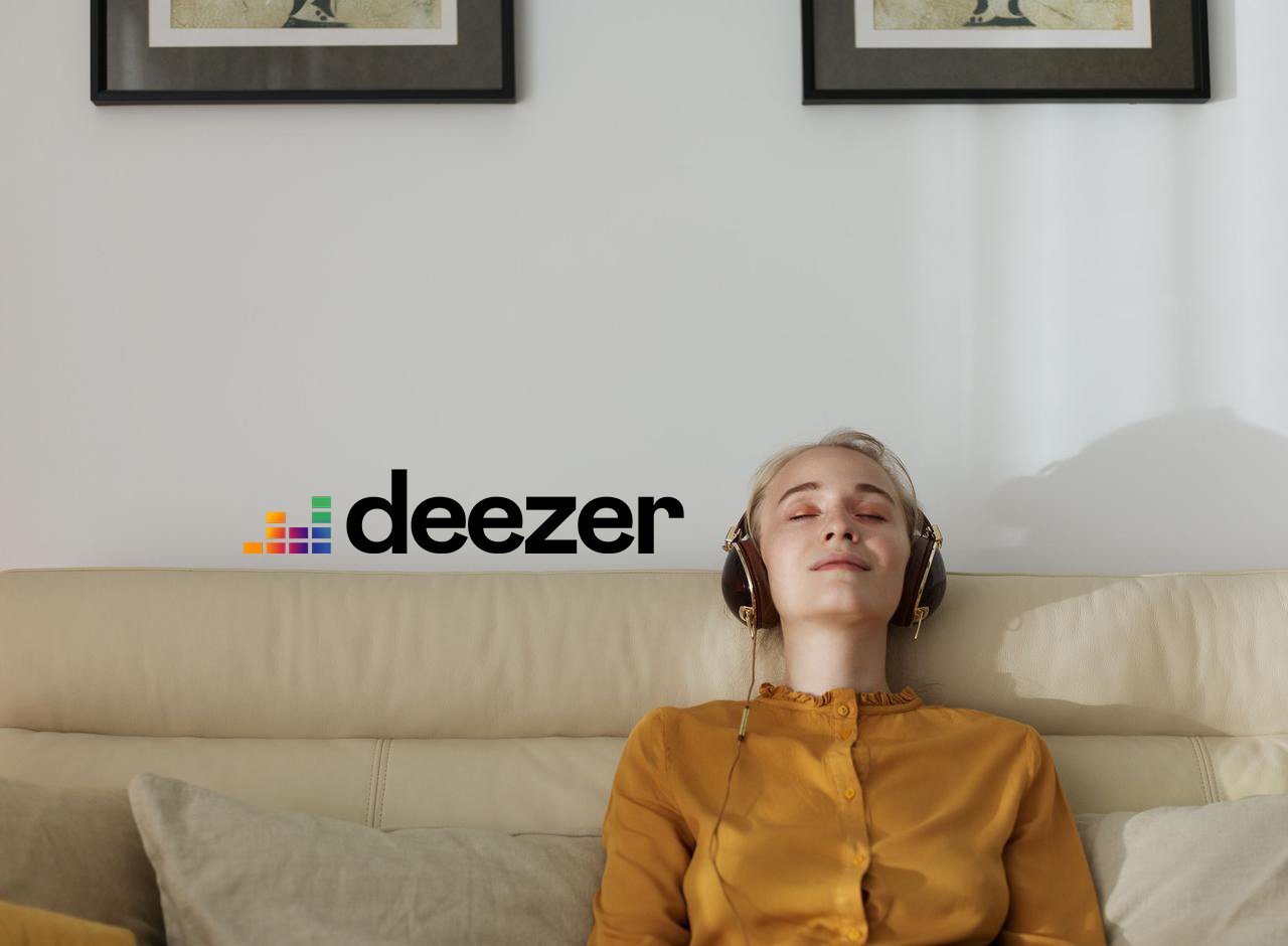 Deezer logo beside sleeping girl