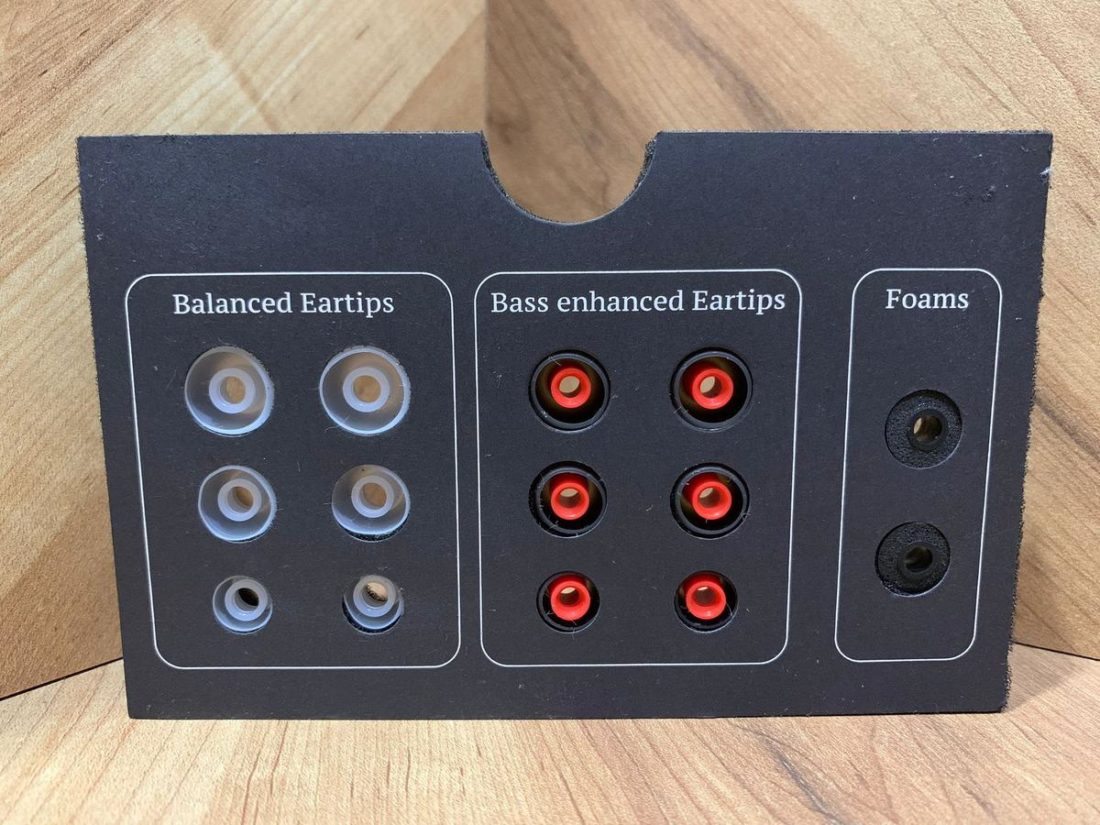 A wide array of eartips are provided. The foam tips provide the best isolation, though they tame the treble. The bass enhanced tips increase bass as per their name, whereas the balanced eartips are indeed the most balanced sounding.
