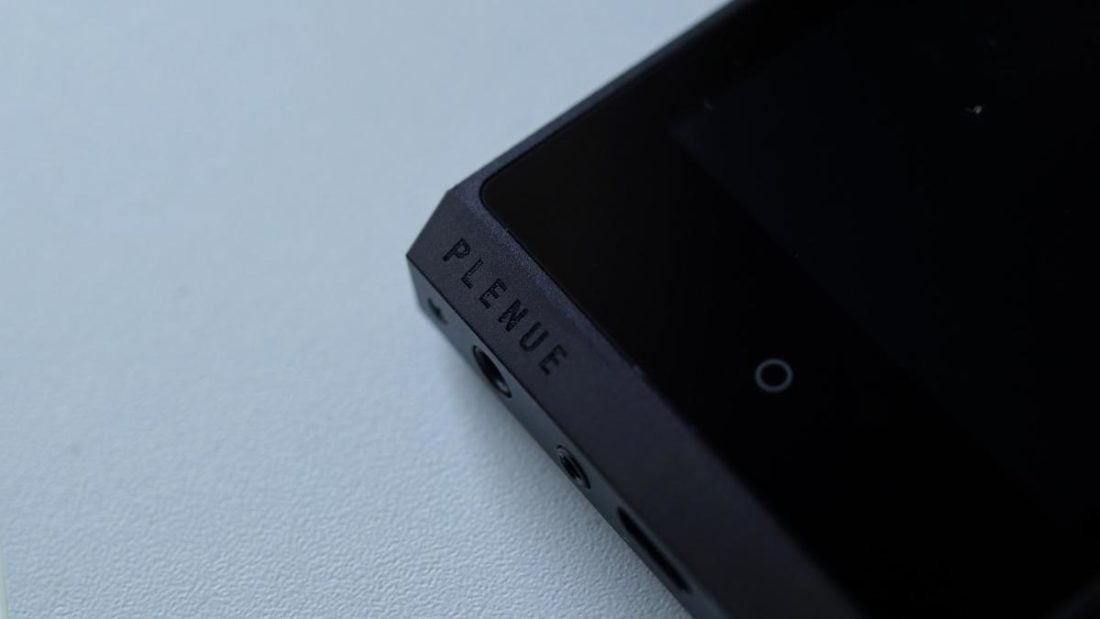 The stealthy Plenue logo on the front and the capacitive button.