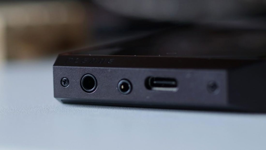 The ports are placed at the bottom of the device.