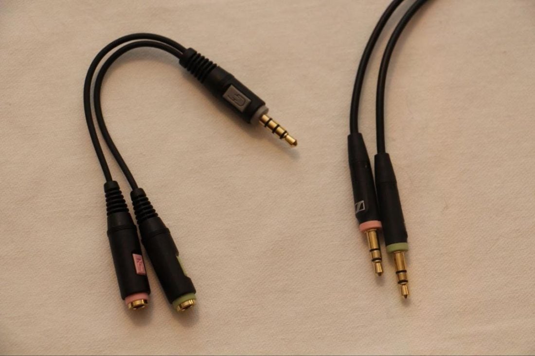 Wired 3.5mm cord on the right, and PCV 05 audio adapter on the left.