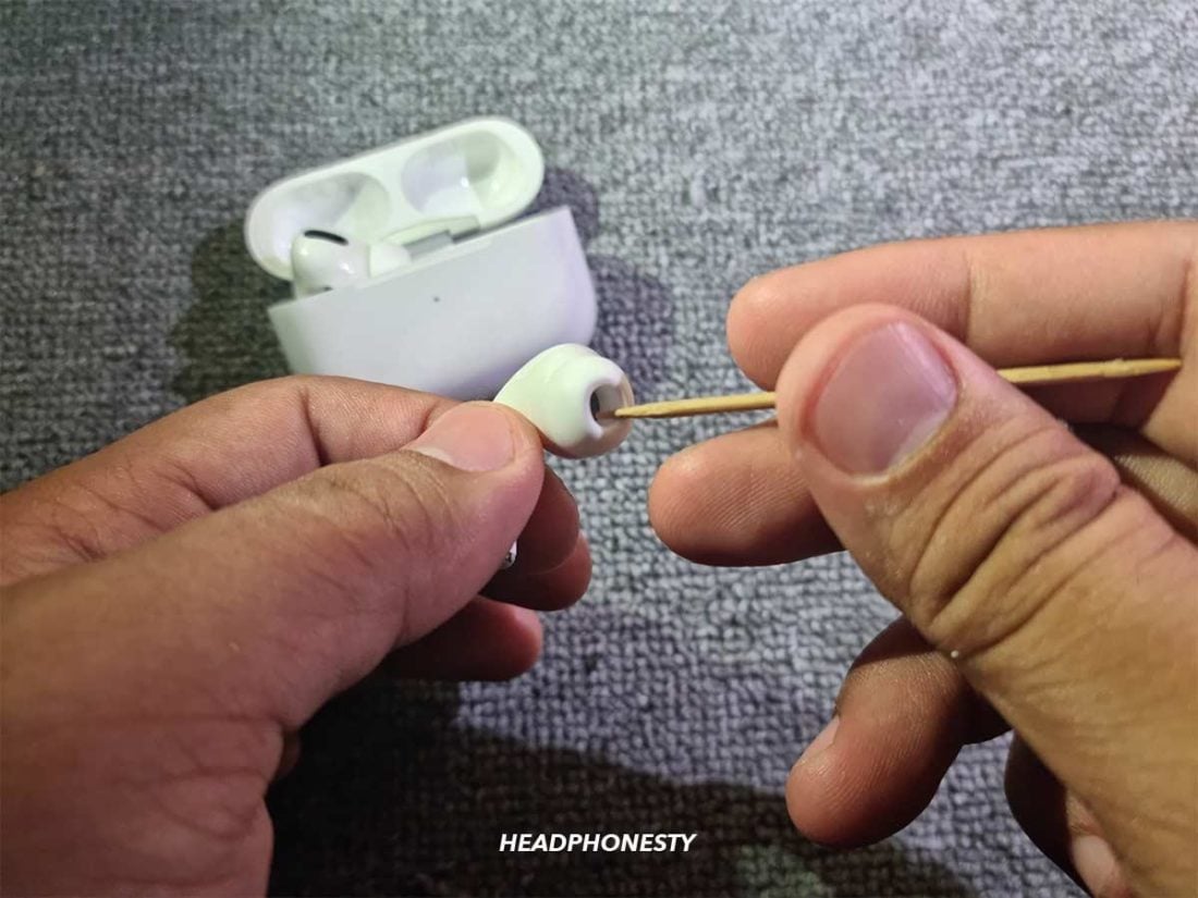 Clean the AirPods speaker with toothpick