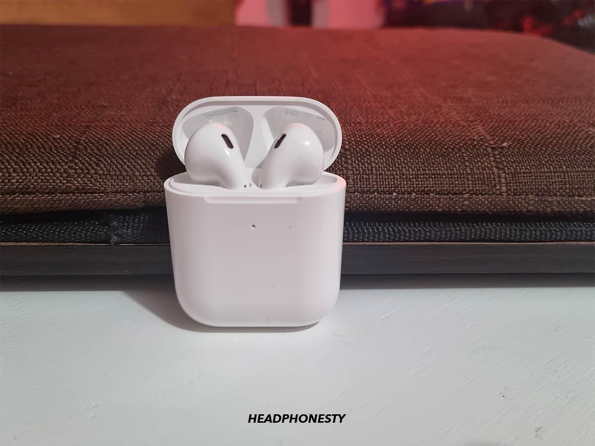 Placing both AirPods in case