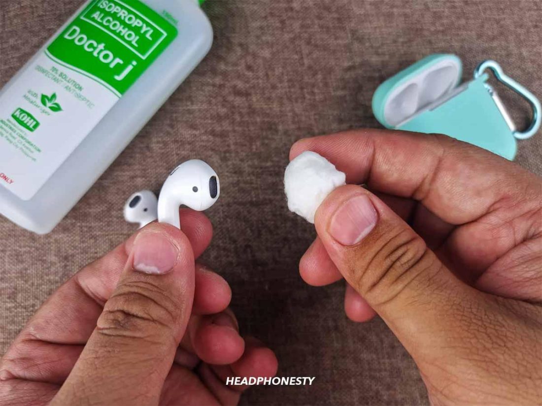 Wipe the outer surface of the AirPods with a cotton ball sprayed with isopropyl alcohol.