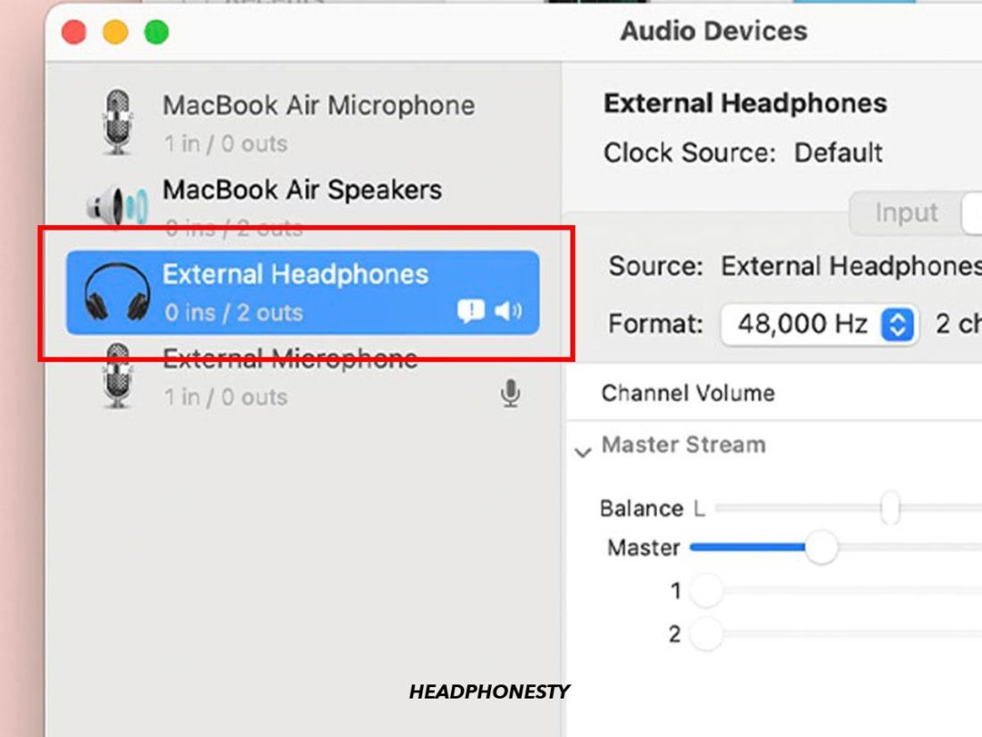 Click on the headset icon to select your output device.
