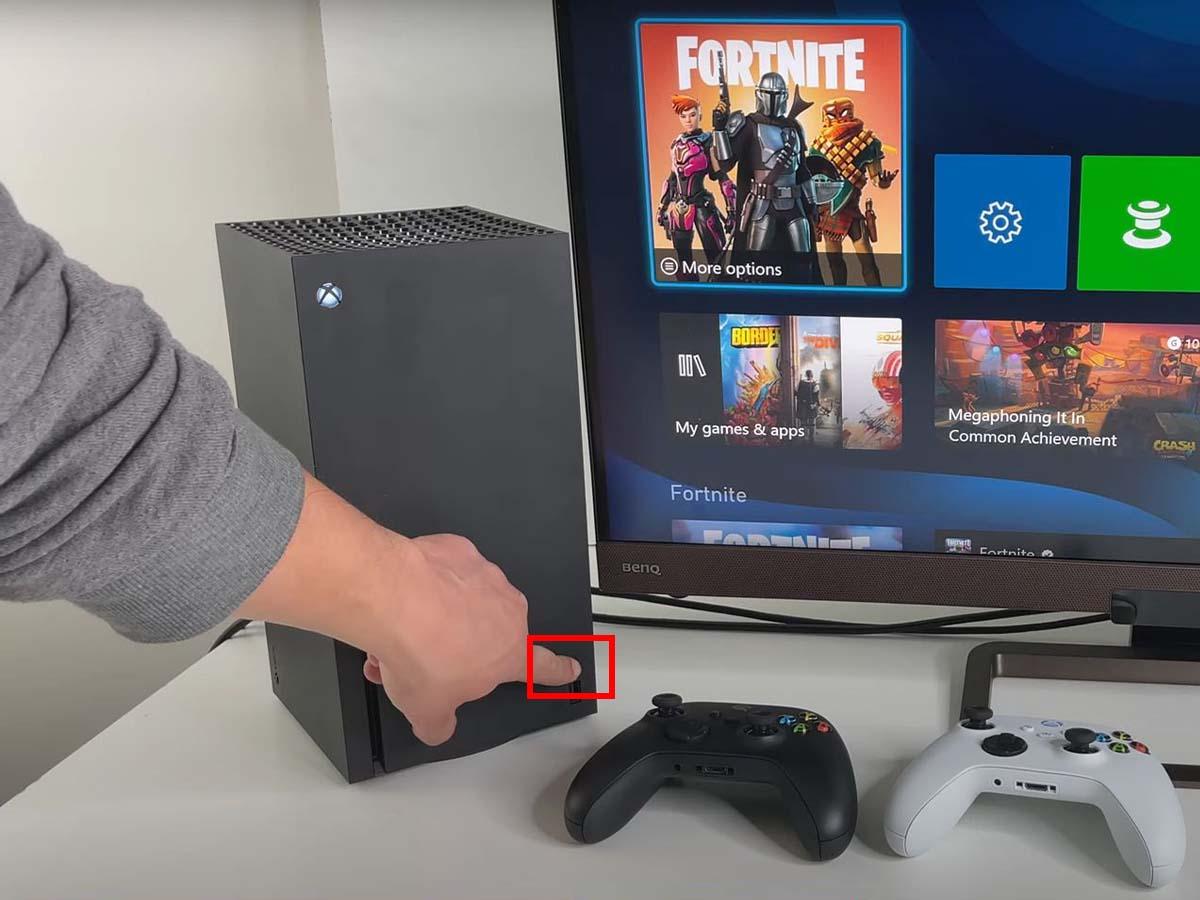 Press the pairing button on your Xbox console (From: YouTube/Open Surprise)