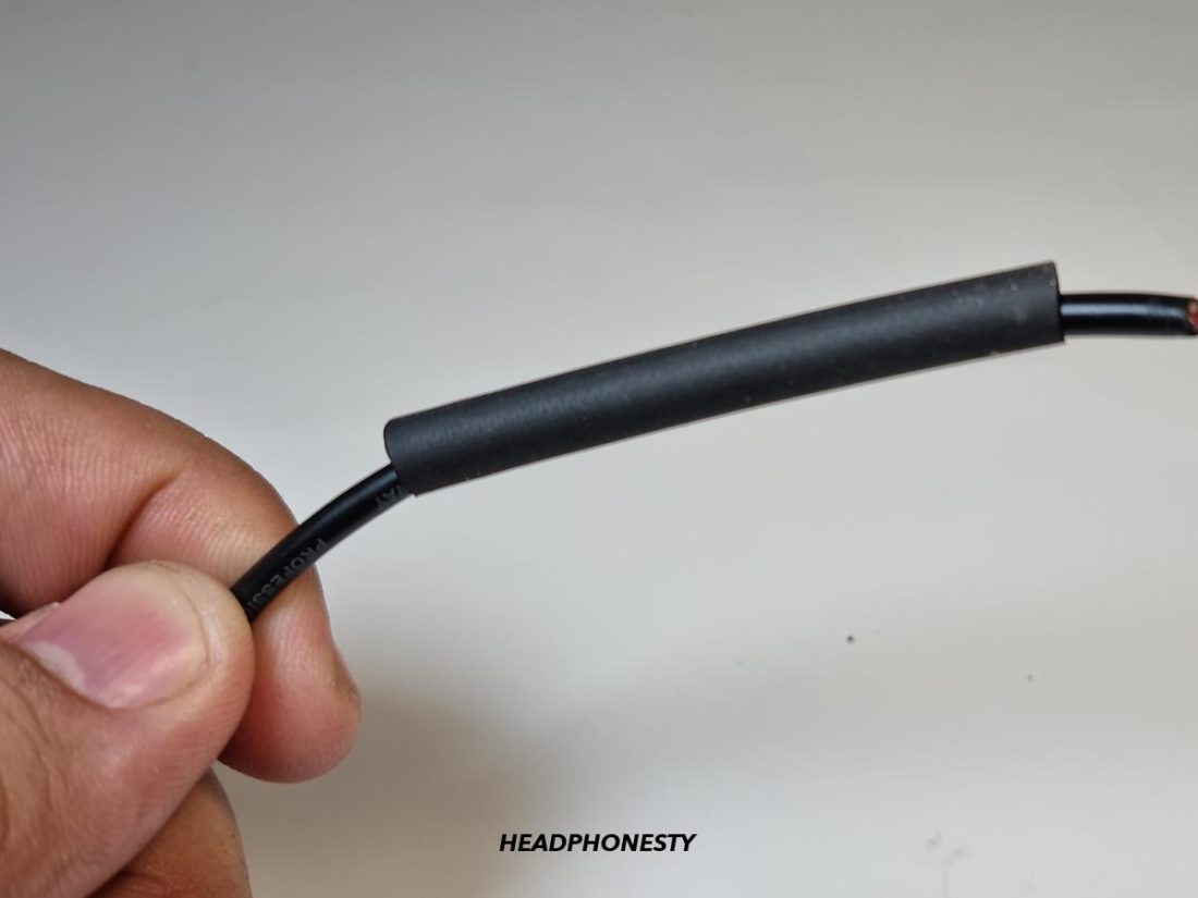 Securing wire with heat-shrink tube
