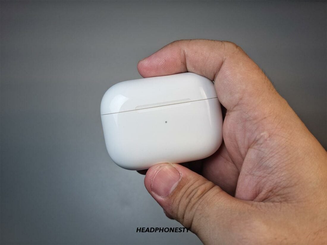 Airpods case with closed lid.