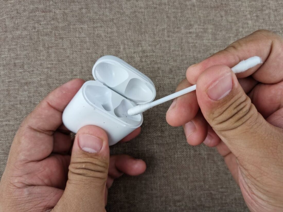 Clean AirPods Charging case with cotton swab