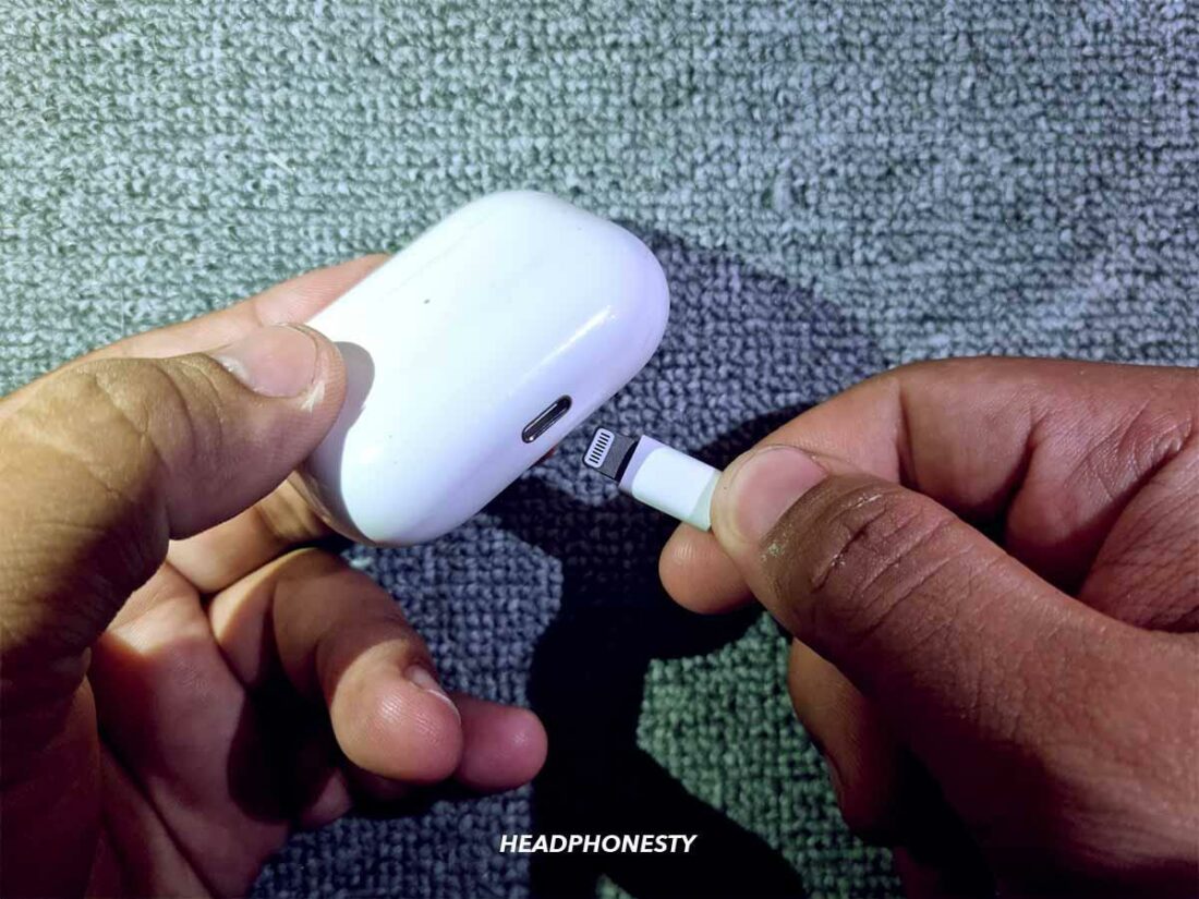 Connect AirPods charger to a power source