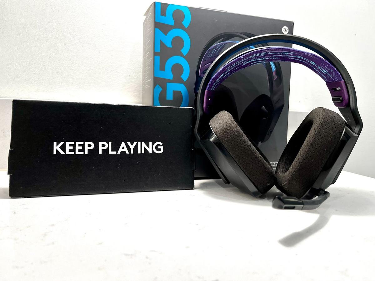 The G535 gaming headset, original product box, and cable box.
