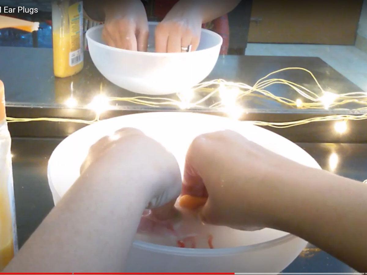 Rinsing foam earplugs (From: Youtube/Nair Mentions)