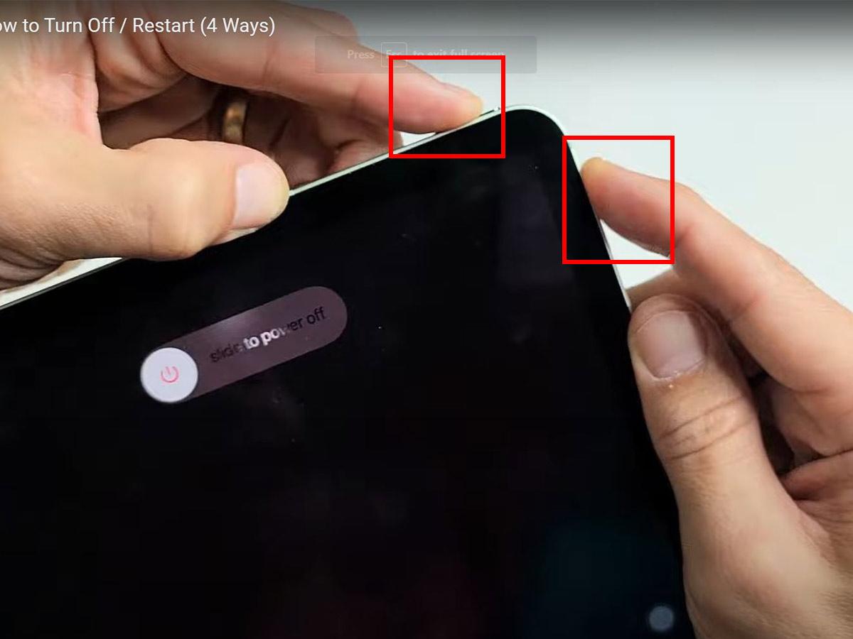 Press the either volume button and unlock button. (From YouTube/TenorShareOfficial)