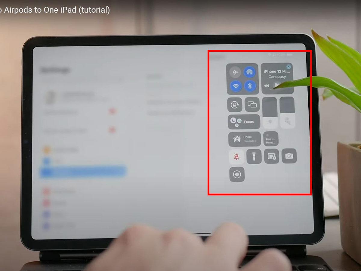 Open the control center by swiping down from the top right corner. (From: YouTube/Foxtecc)