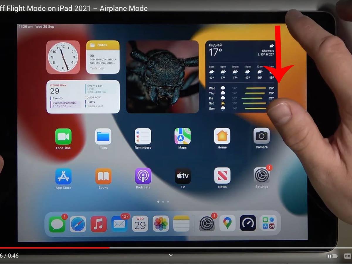 Open the control center by dragging from the top corner of the screen. (From: YouTube/HardReset.Info)